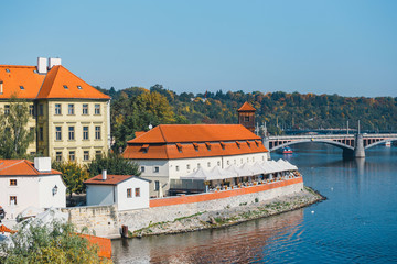 Fototapeta na wymiar Vltava river and old downtown of Prague, the capital of Czech Republic