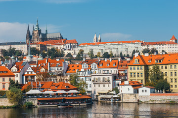 Fototapeta na wymiar Vltava river and old downtown of Prague, the capital of Czech Republic