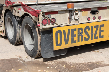Oversize sign on the back of a semi truck