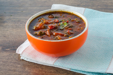 Bowl of traditional soup Borscht on table