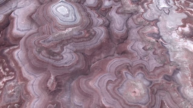 View of colorful patters in the Mars like desert flying through Utah.