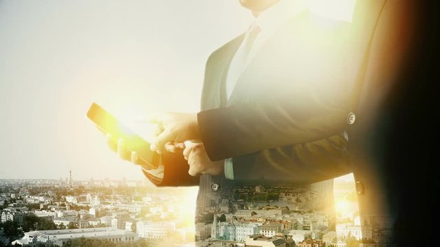 Podil ,Kiev ,Ukraine,Cityscape Businessman digital tablet. Double exposure.