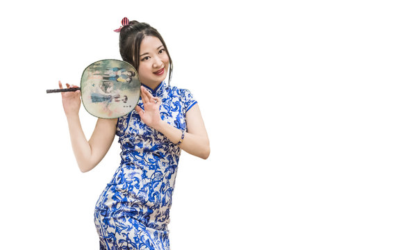 A Young Oriental Girl In Cheongsam (Qi Pao) Is Preparing For Fashion Show