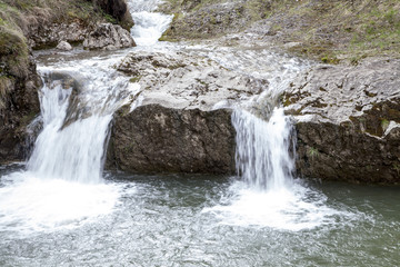 Mountain waterfall on the winter time