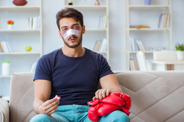 Young man defeated in sports game suffered loss with broken blee