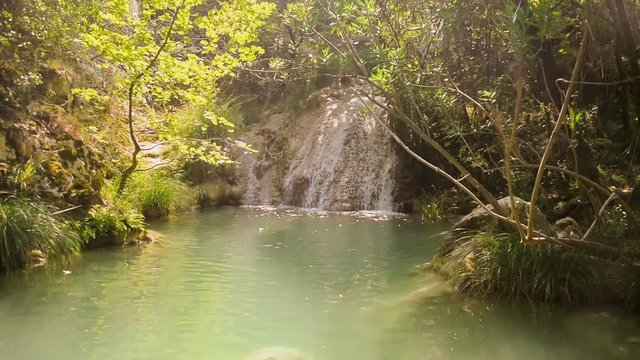 Beautiful waterfall in the nature touristic destination at Polilimnio in Peloponnese Greece.