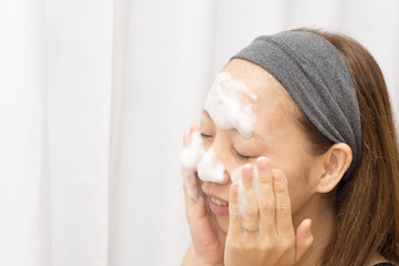 Japanese lady washing face
