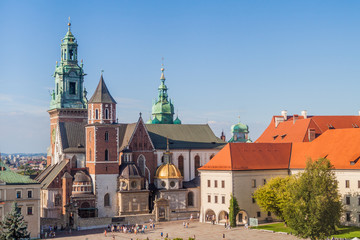 Fototapeta na wymiar KRAKOW, POLAND - SEPTEMBER 4, 2016: Tourists visit Wawel castle in Krakow, Poland