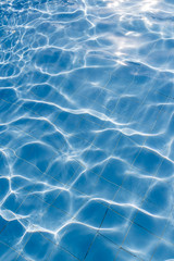 Surface of swimming pool water background
