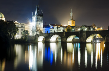 Fototapeta na wymiar Charles Bridge and Prague at night