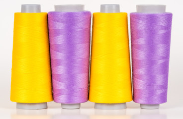 Vary colored thread coils