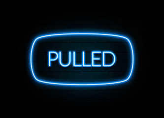 Pulled  - colorful Neon Sign on brickwall