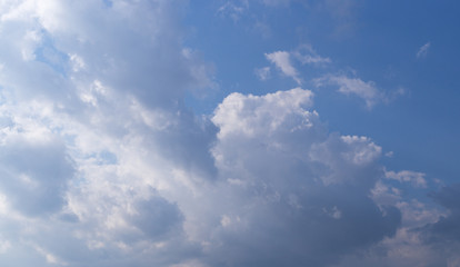 Fototapeta na wymiar bright blue sky with clouds and sun. cumulus, background, weather.