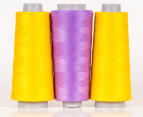Vary colored thread coils
