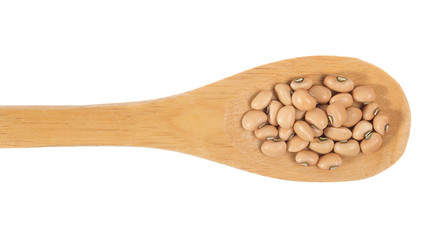 Grains over wooden bamboo spoon. Isolated, White background.