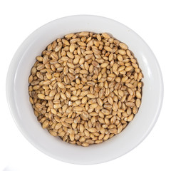 Top view of grains on ceramics bowl.