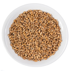 Top view of grains on ceramics bowl.