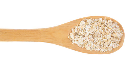 Grains over wooden bamboo spoon. Isolated, White background.