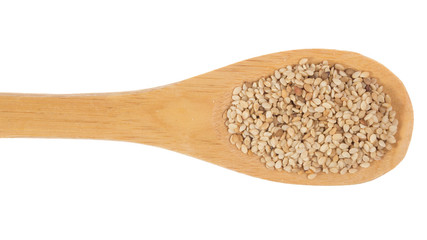 Grains over wooden bamboo spoon. Isolated, White background.