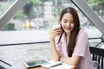 Fototapeta premium Young businesswoman working outdoors