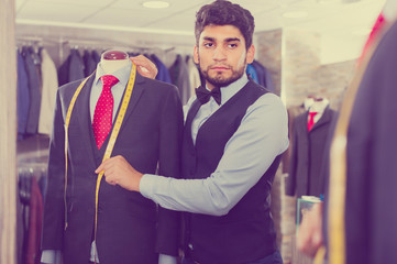 Person is creating business image with red tie