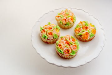 Top view decorated cupcakes on white Background.