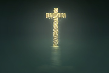 Cross with christmas lights decoration
