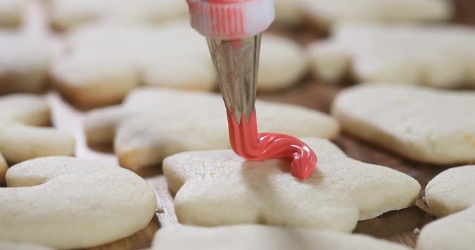 red icing on a sugar cookie