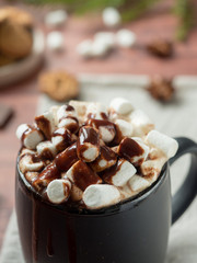 Christmas drink Hot chocolate with marshmallow and cinnamon sticks, cookies. Christmas winter concept. Close up