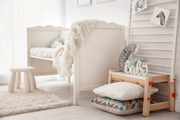 Baby bedroom decorated with pictures of animals