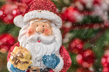A close up view of a Santa Claus face for a snowy Christmas scene