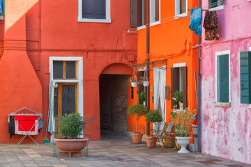 Colourfully painted house facade on Burano island, province of Venice, Italy