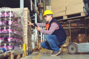 Warehouse worker scanning box