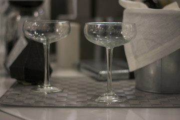 two glasses on a gray table