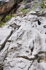 A rock climber on a wall.