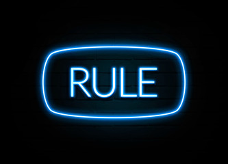 Rule  - colorful Neon Sign on brickwall