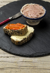 Toasted bread with different pates.