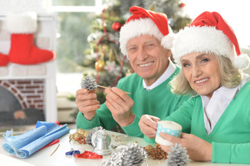 Senior couple preparing for Christmas
