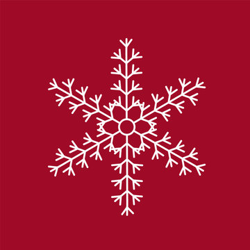 White snowflake on a red background. Christmas and New Year's ba
