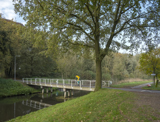 Scherpenzeel, Netherlands, 4 november 2017: paople ride bicycle near valleikanaal at Scherpenzeel in the netherlands