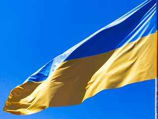 flag of Ukraine against the blue sky