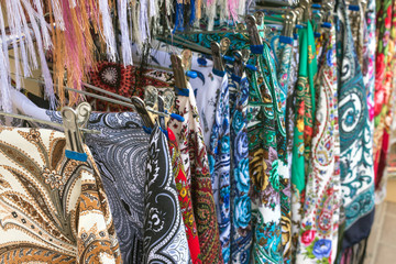 Russian colorful traditional scarfs for sale in a gift shop