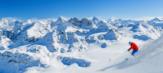 Skiing with amazing view of swiss famous mountains in beautiful winter snow  Mt Fort. The matterhorn and the Dent d'Herens. In the foreground the Grand Desert glacier. - obrazy, fototapety, plakaty