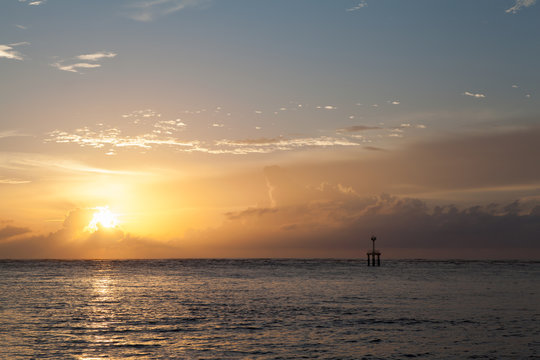 sunset on the beach with lighthouse © Eakkapon Sriharun