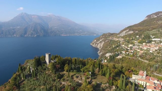 Panoramic view with drone, castle of Vezio and village of Perledo. Lake of Como