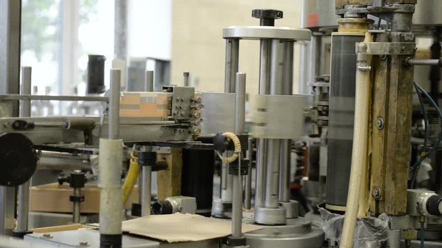 Automatic labeling machine during operation.