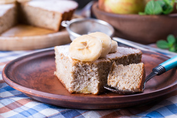 Slice of banana cake on a plate