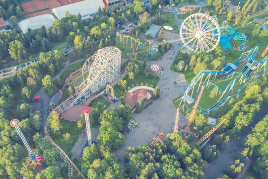 Ferris Wheel And Roller Coaster In An Amusement Park, Top View