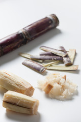 Sugar cane condiments on white table