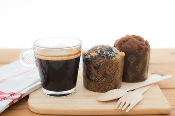 Cup of espresso and muffin bakery.